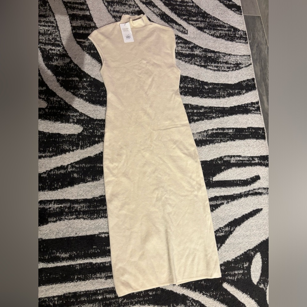 Cream maxi sweater dress with slit in the back size large